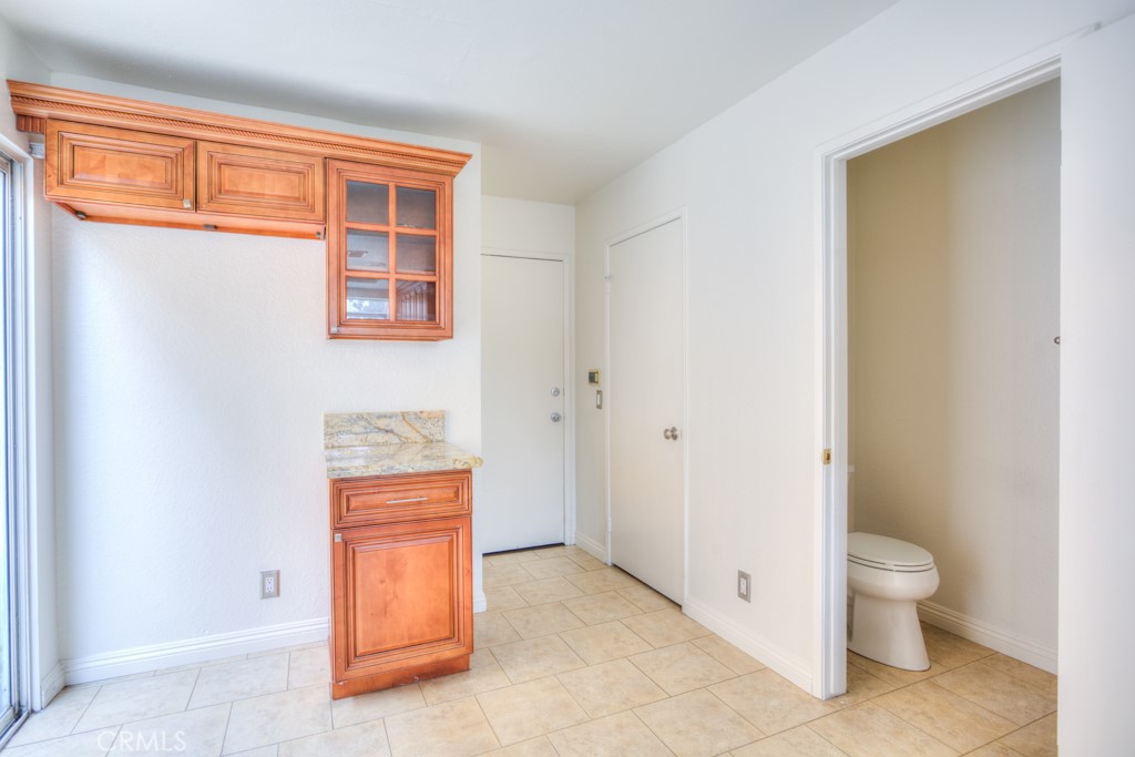 13006 Parkview Drive Baldwin Park, CA 91706 - Photo 11 of 46 a bathroom with a toilet sink and mirror