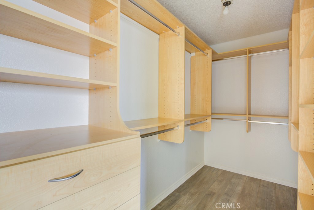 13006 Parkview Drive Baldwin Park, CA 91706 - Photo 26 of 46 a view of walk in closet with empty racks