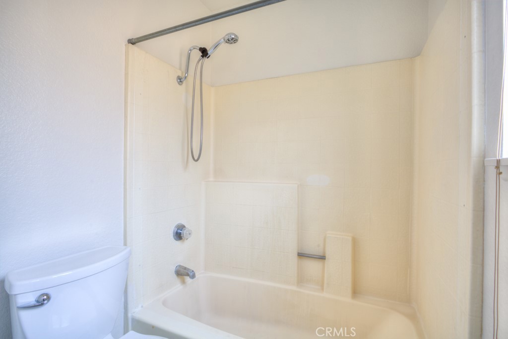 13006 Parkview Drive Baldwin Park, CA 91706 - Photo 38 of 46 a bathroom with a shower and a bath tub