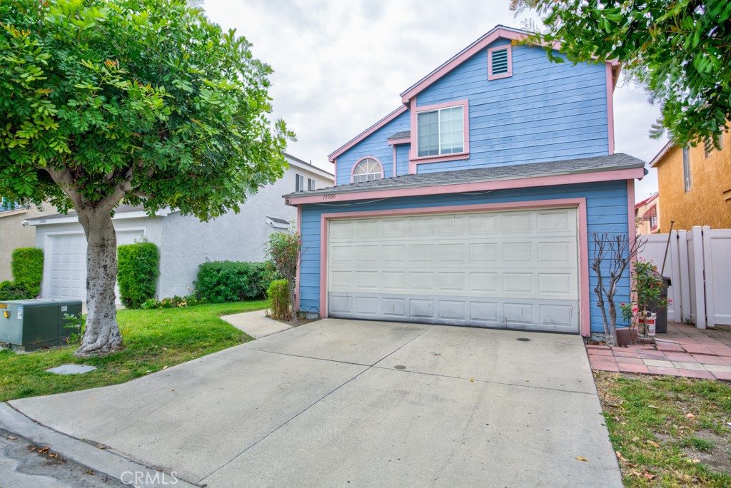 13006 Parkview Drive Baldwin Park, CA 91706 - Photo 43 of 46 a front view of a house with a garage