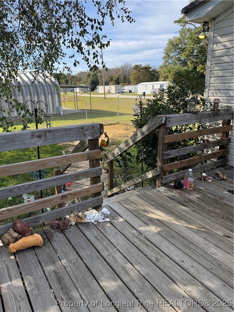 3082 Alamac Road Lumberton, NC 28358 - Photo 23 of 30 Side Porch leading to a small fenced area for your small pets