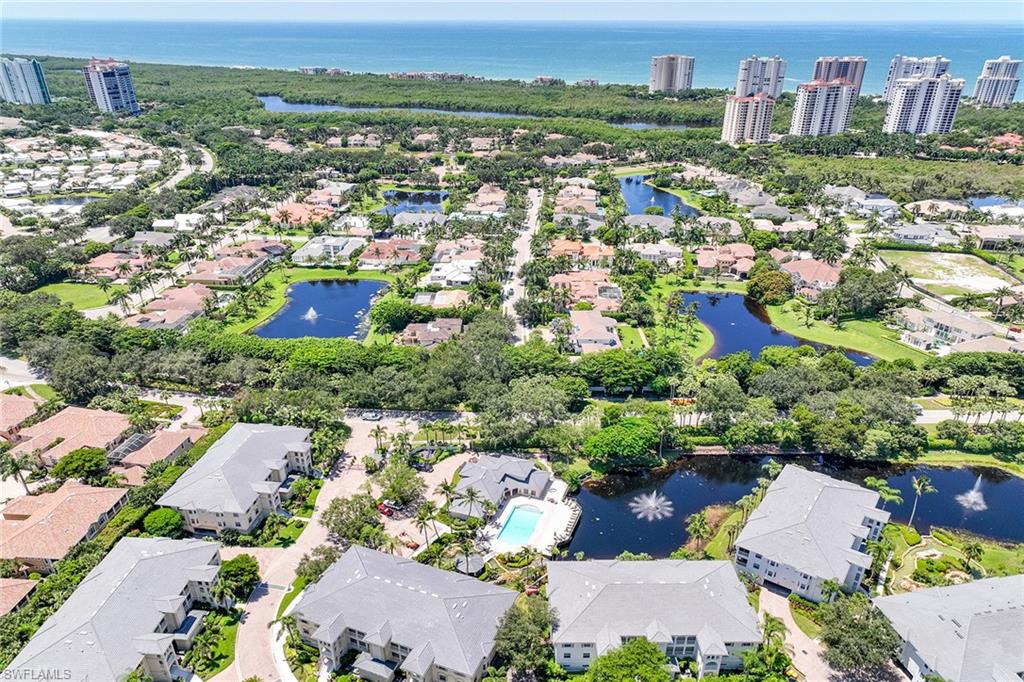 795 Bentwater Circle, Unit 203 Naples, FL 34108 - Photo 3 of 33 an aerial view of multiple house