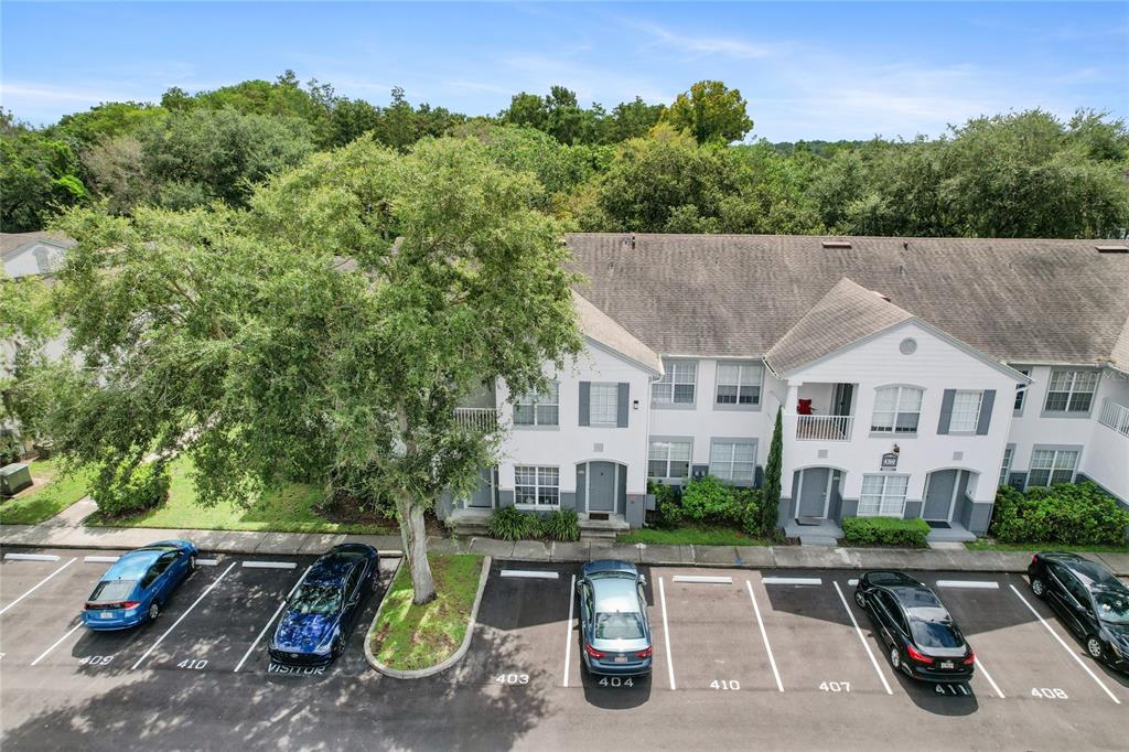 4360 South Kirkman Road, Unit 4 Orlando, FL 32811 - Photo 19 of 21 an aerial view of a house with garden space and street view