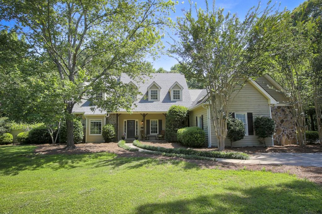 A paradise in Milton!  The lot is 1.9 level acres with a level, fenced backyard.  Gorgeous setting!!
