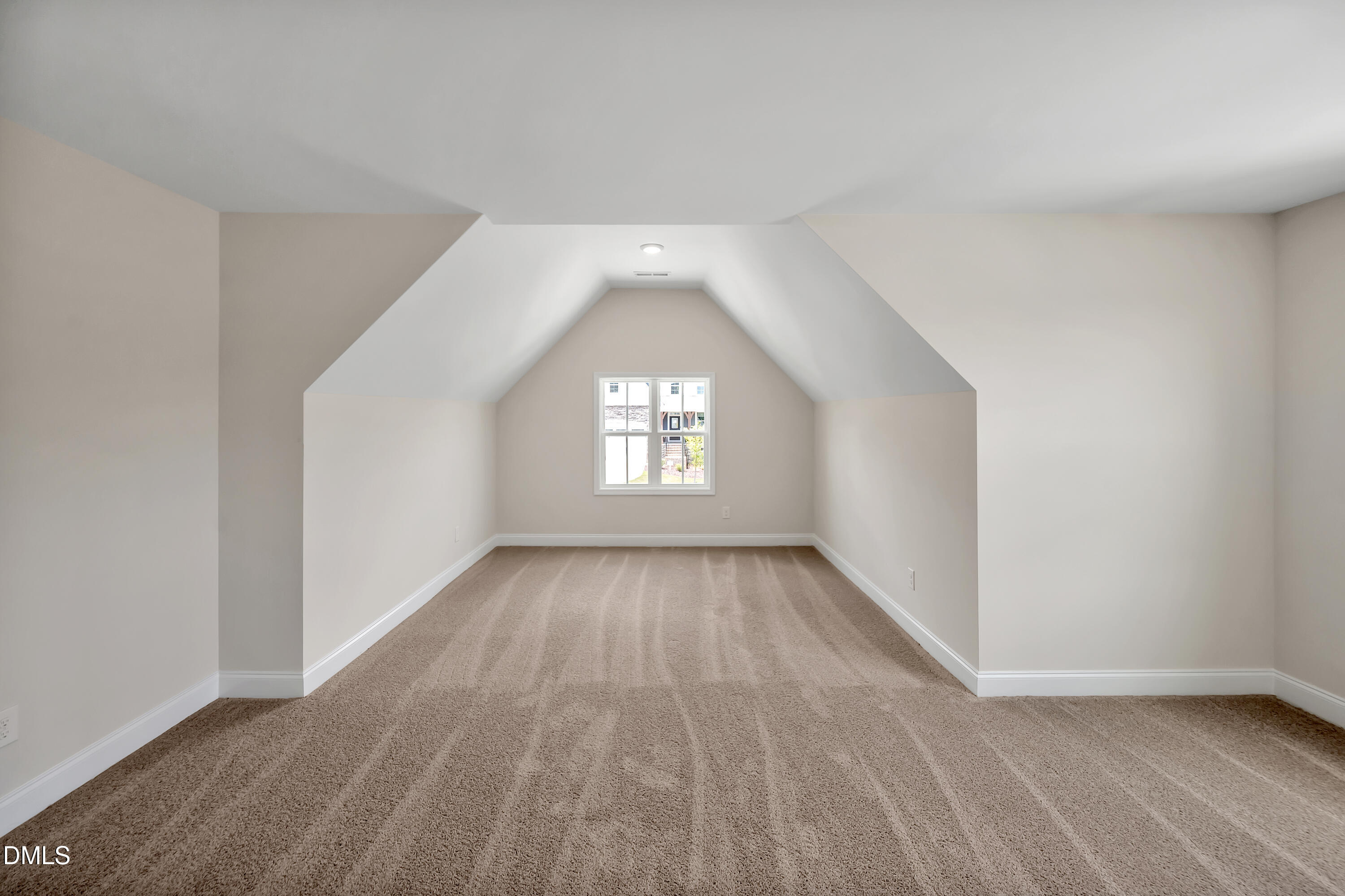 1108 Prominence Drive Durham, NC 27712 - Photo 11 of 27 an empty room with wooden floor and window