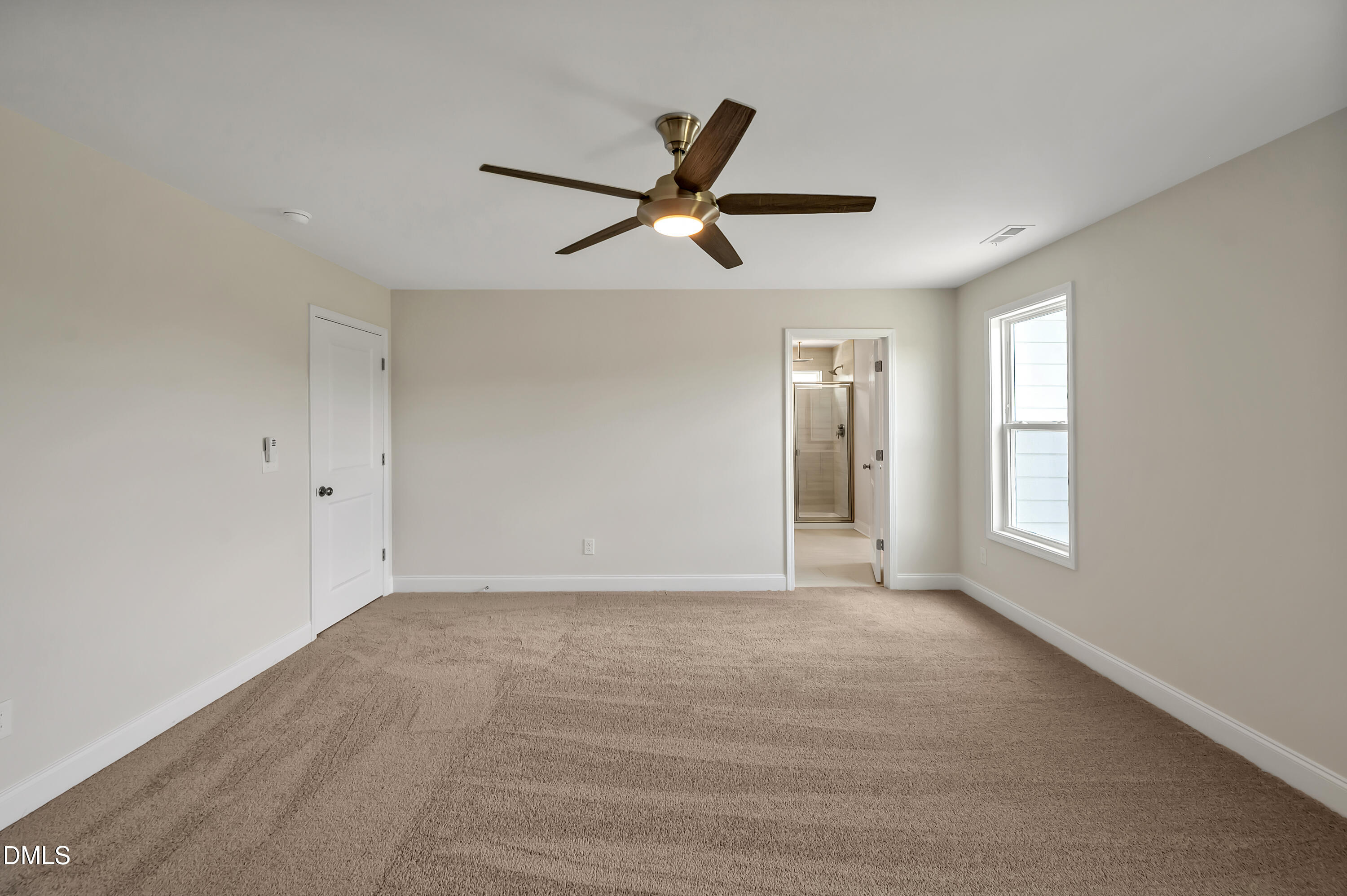 1108 Prominence Drive Durham, NC 27712 - Photo 12 of 27 a view of an empty room with a window