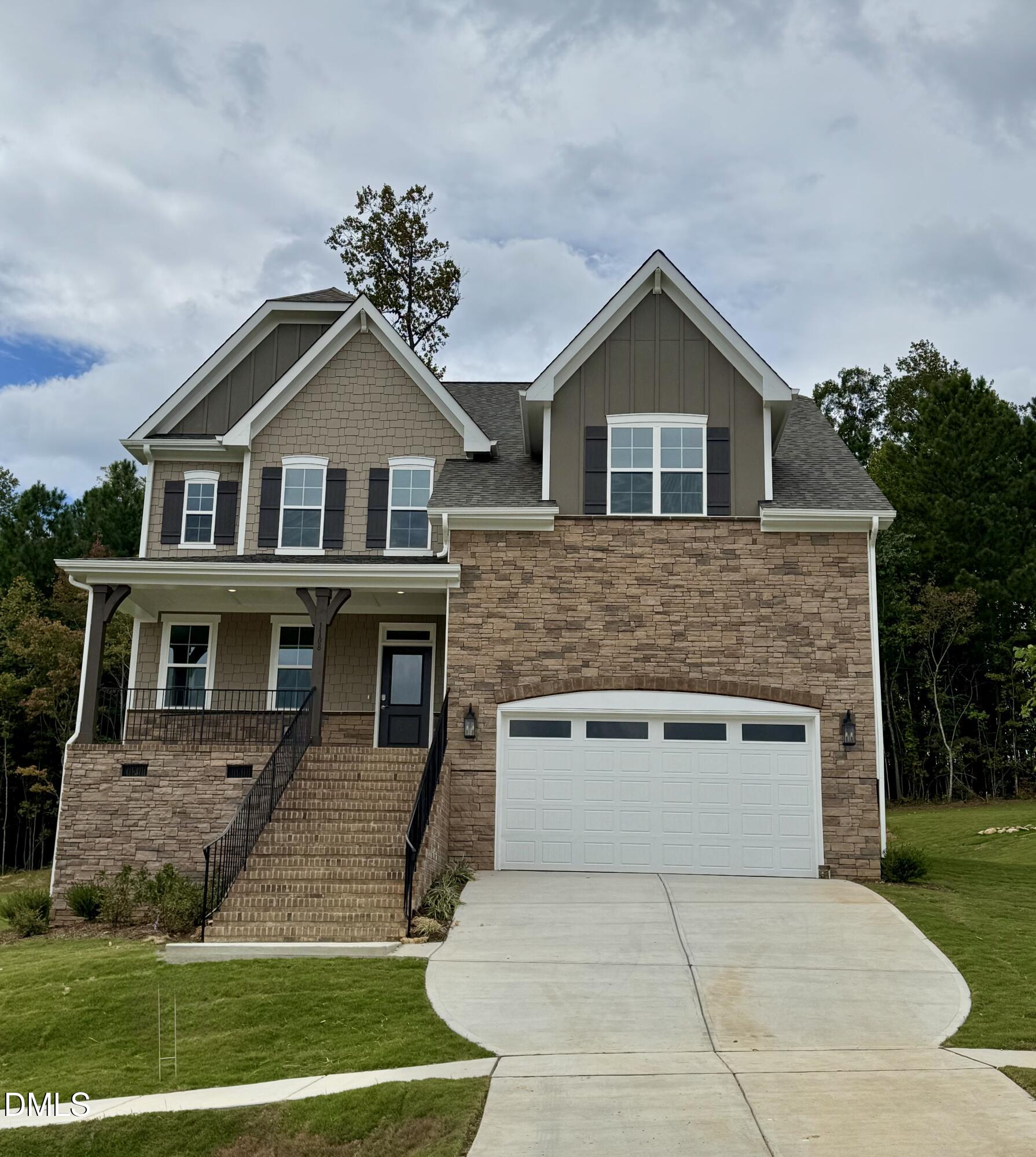 1108 Prominence Drive Durham, NC 27712 - Photo 3 of 27 a front view of house with yard and green space