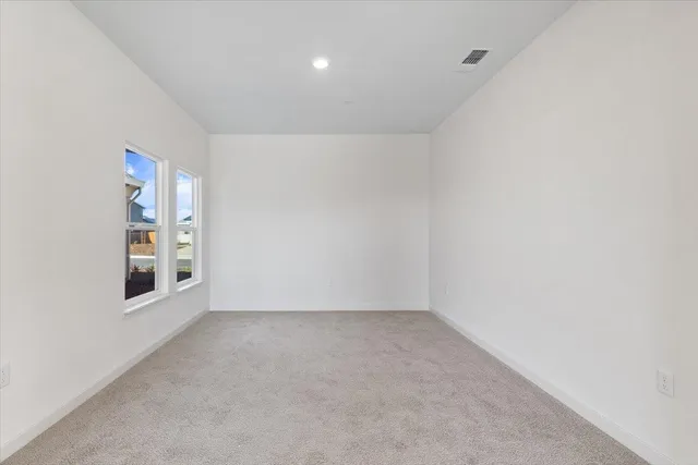 a view of a livingroom and dining room