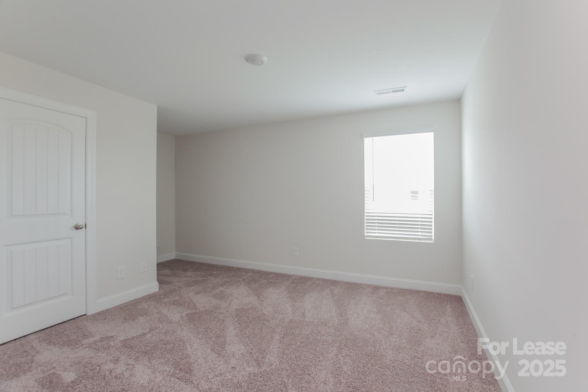 2057 Swanport Lane Monroe, NC 28110 - Photo 11 of 17 a view of an empty room with a window