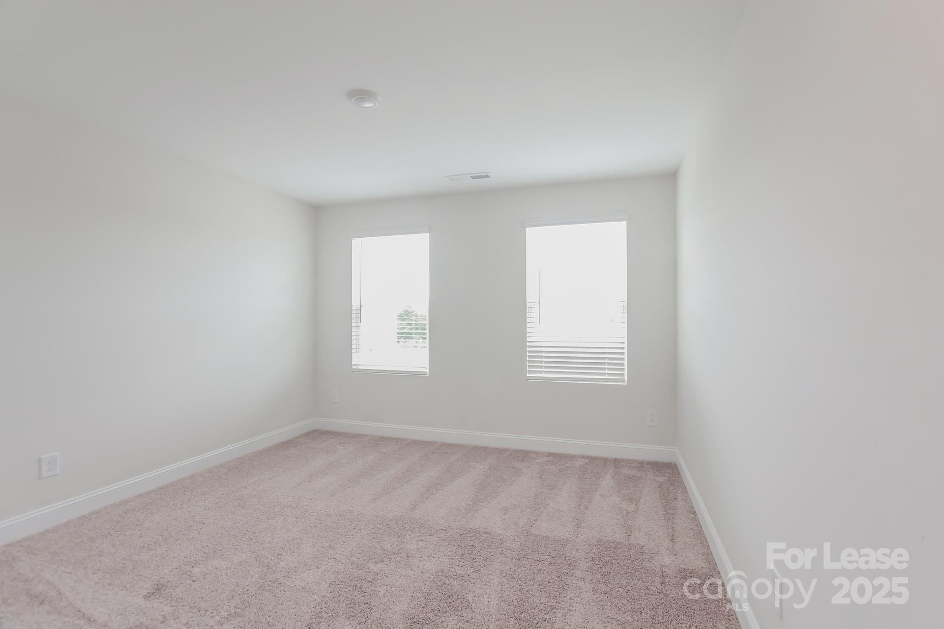 2057 Swanport Lane Monroe, NC 28110 - Photo 12 of 17 an empty room with a window