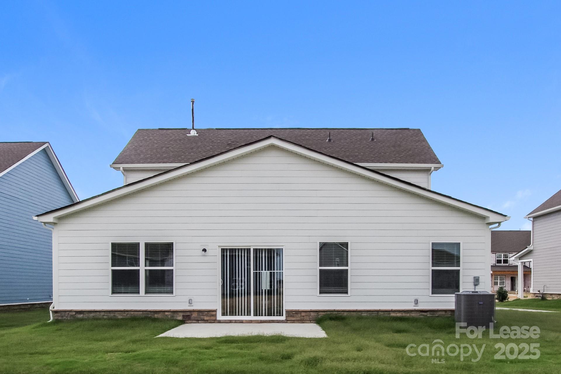 2057 Swanport Lane Monroe, NC 28110 - Photo 15 of 17 a front view of a house with a yard