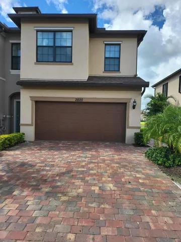 a house view with a outdoor space