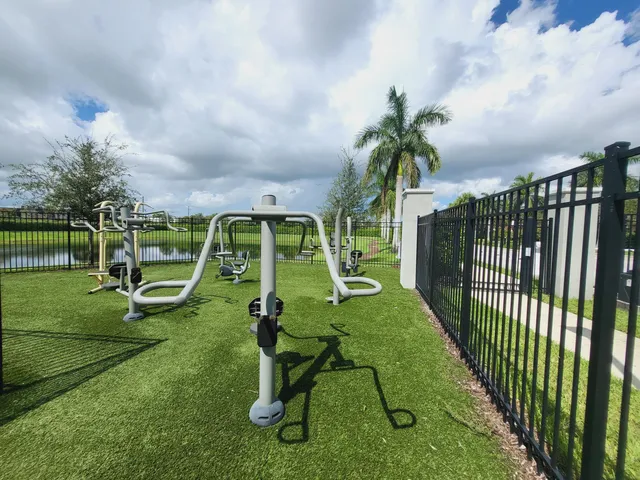 a view of a patio with a table and chairs