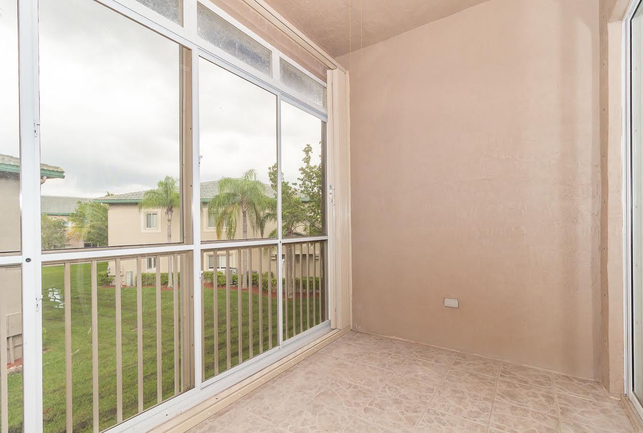 7946 Exeter Circle East, Unit 202 Tamarac, FL 33321 - Photo 8 of 27 exeter balcony