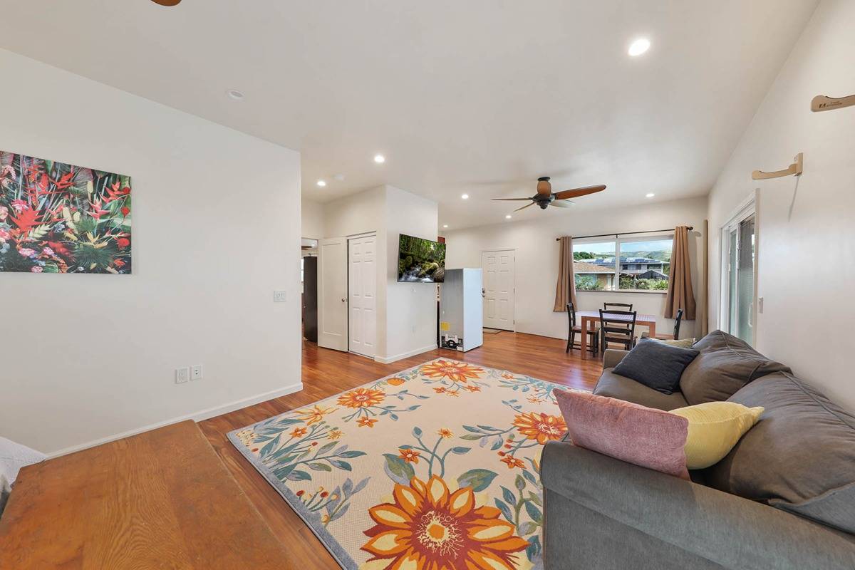 4598 Pueo Road, Unit B Kekaha, HI 96752 - Photo 17 of 27 a living room with furniture and a rug