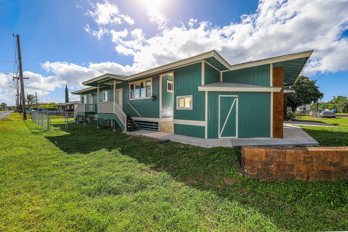 4598 Pueo Road, Unit B Kekaha, HI 96752 - Photo 20 of 27 a front view of a house with garden