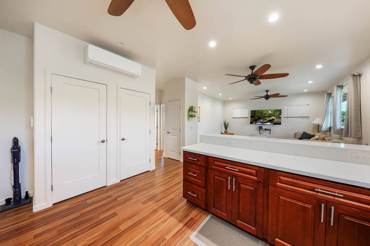 4598 Pueo Road, Unit B Kekaha, HI 96752 - Photo 10 of 27 a spacious bathroom with a double vanity sink and a mirror