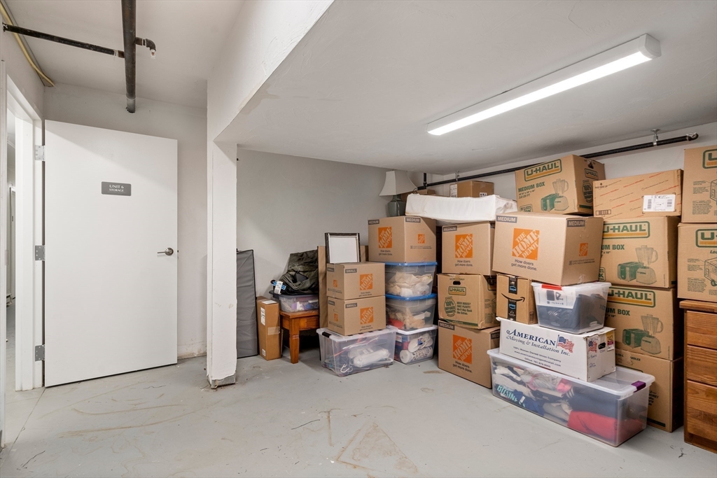 130 Coleridge Street, Unit 6 Boston, MA 02128 - Photo 13 of 26 a view of work space with furniture and a ceiling fan