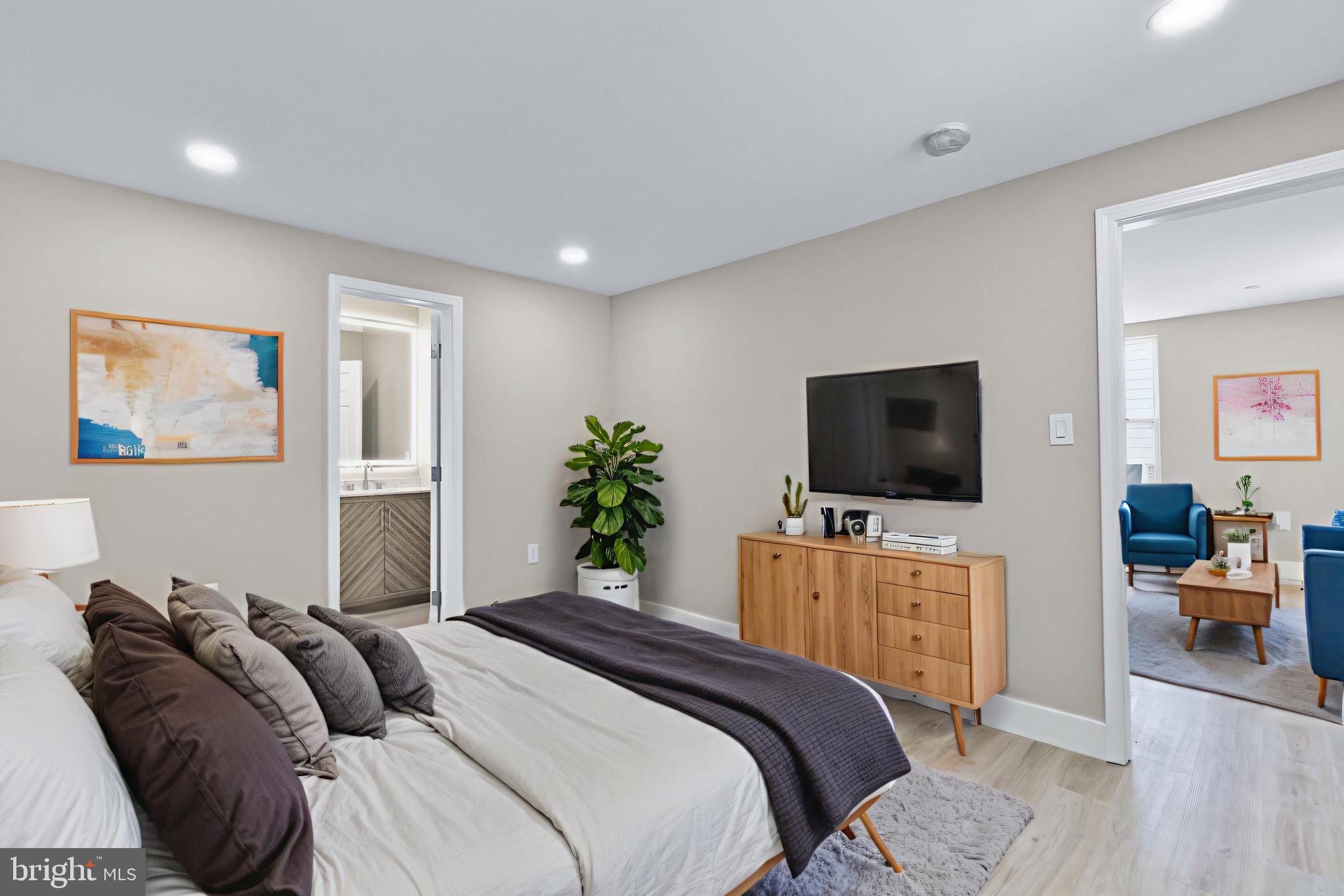 11 Baker Street Mount Airy, MD 21771 - Photo 11 of 30 a bedroom with a bed and a flat screen tv