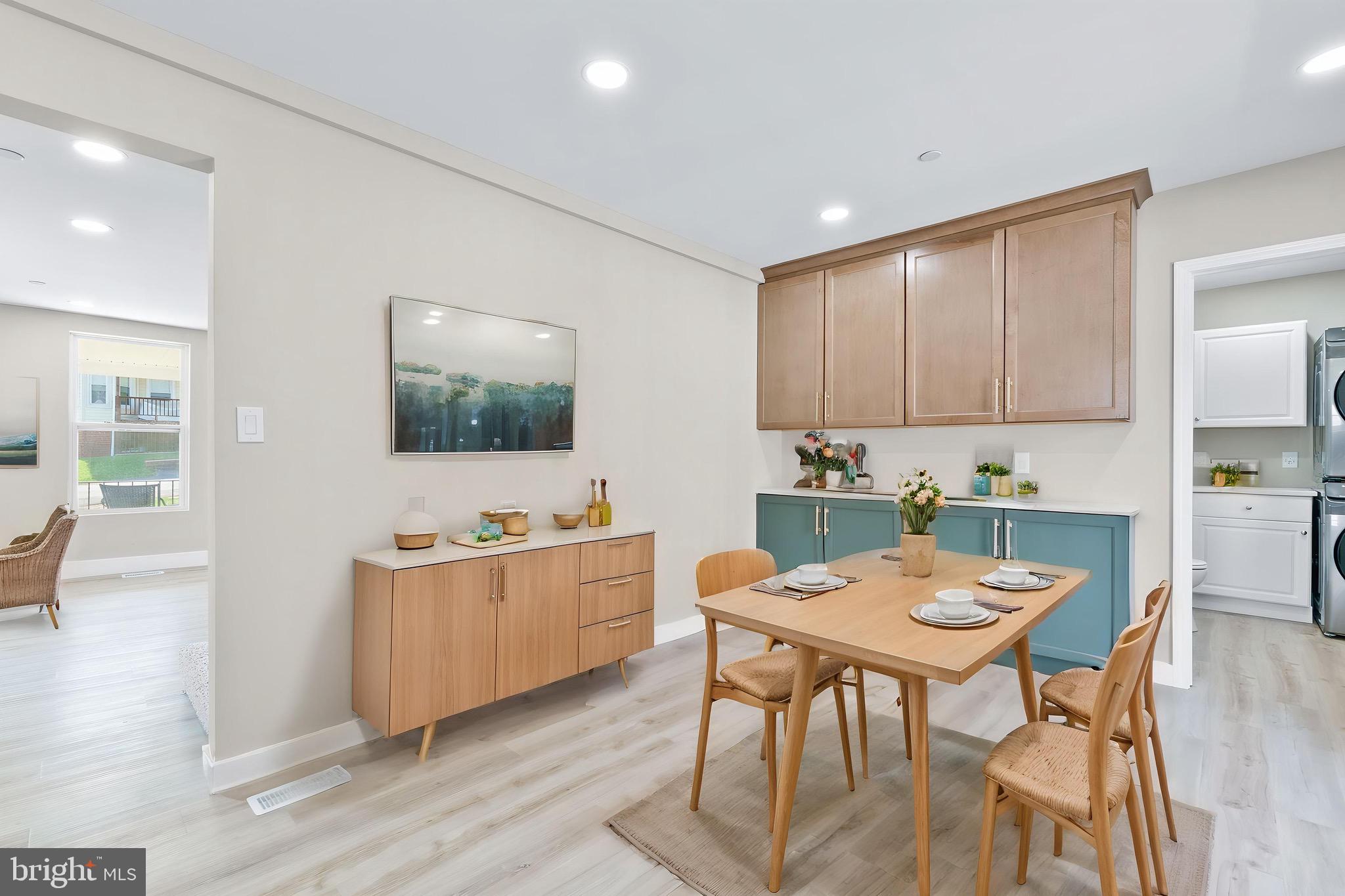 11 Baker Street Mount Airy, MD 21771 - Photo 15 of 30 a kitchen with a table and chairs in it