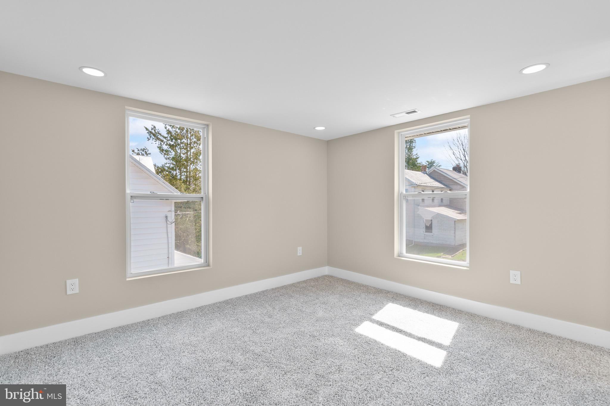 11 Baker Street Mount Airy, MD 21771 - Photo 22 of 30 an empty room with windows