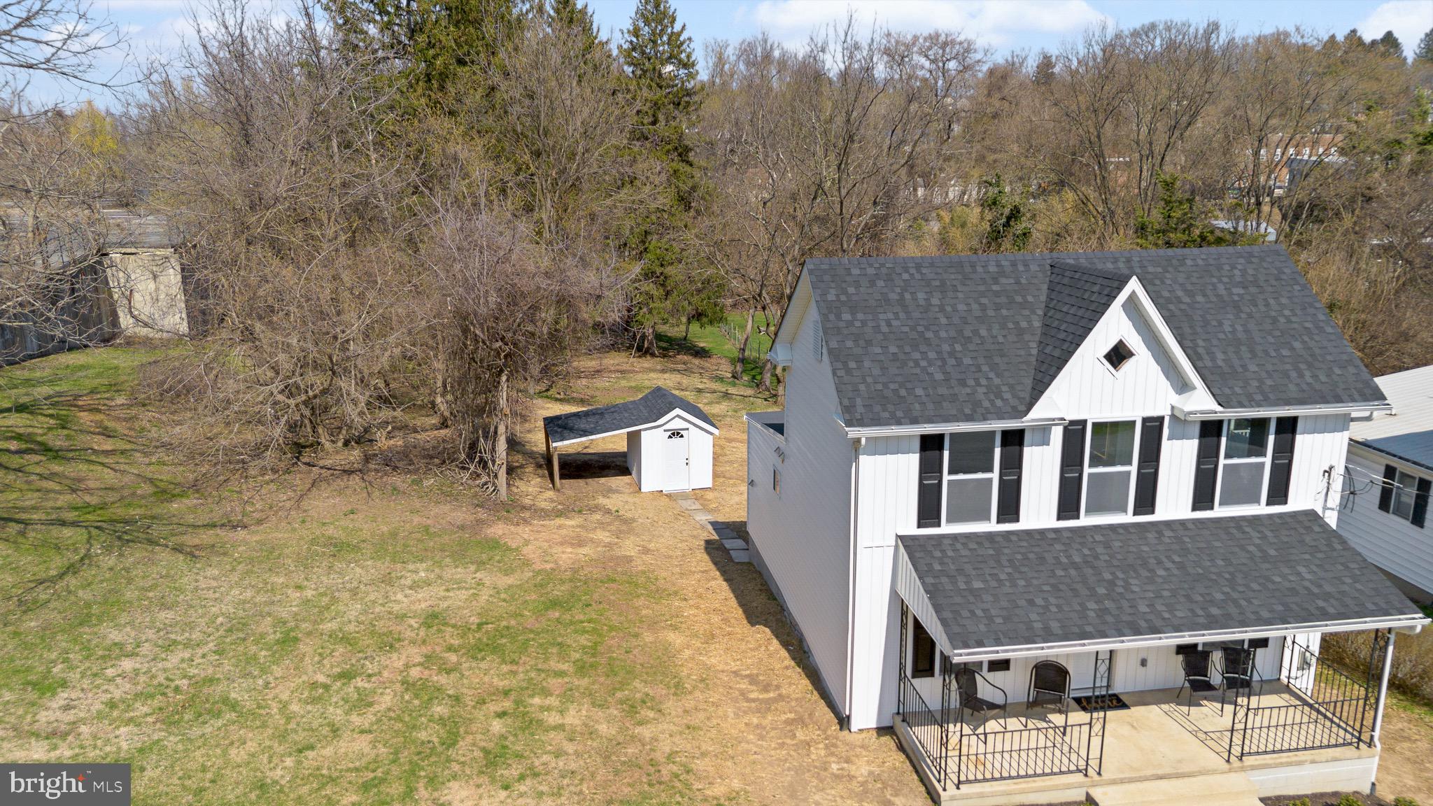 11 Baker Street Mount Airy, MD 21771 - Photo 3 of 30 a aerial view of a house with a yard