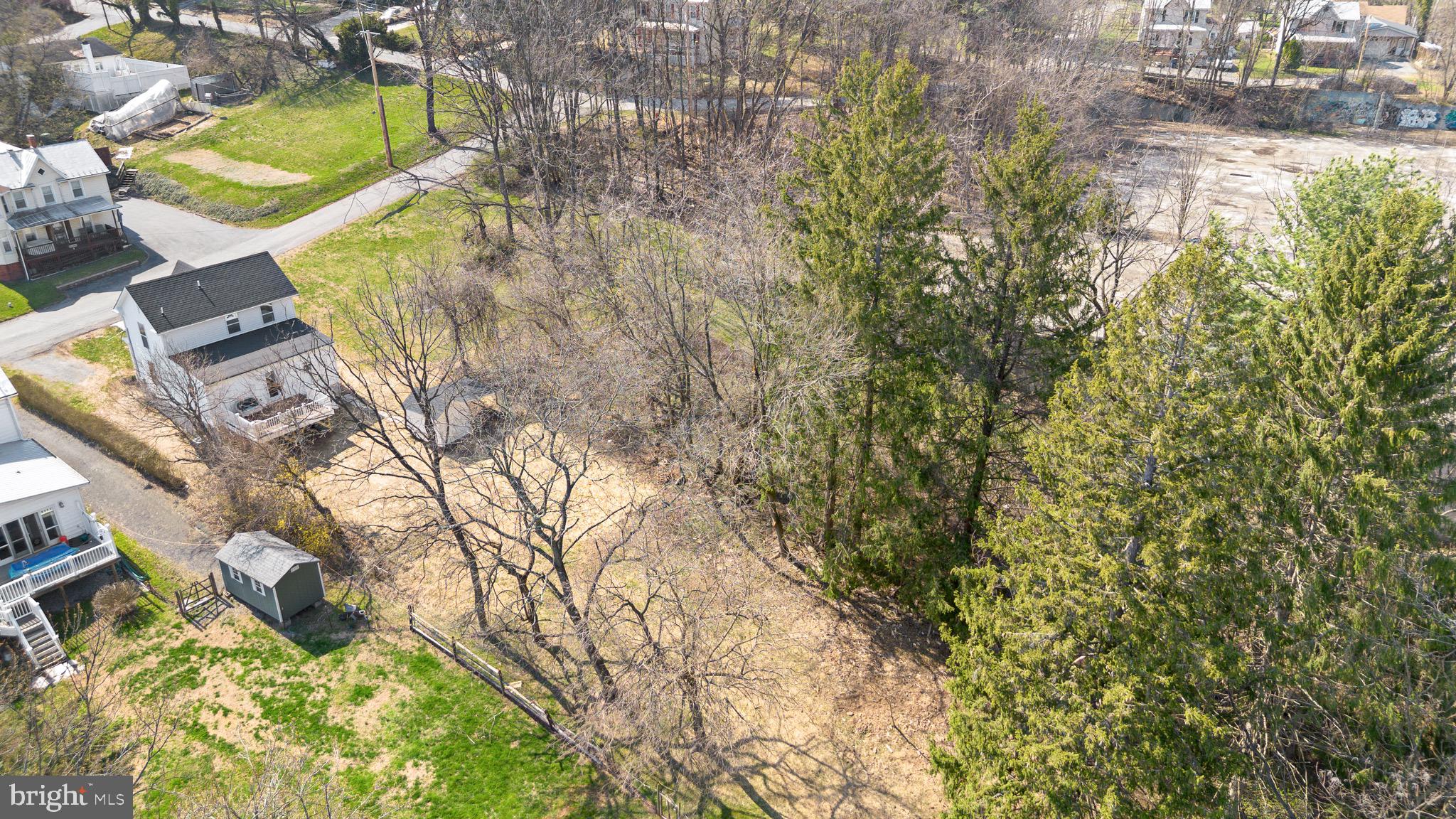 11 Baker Street Mount Airy, MD 21771 - Photo 5 of 30 a view of a yard with plants