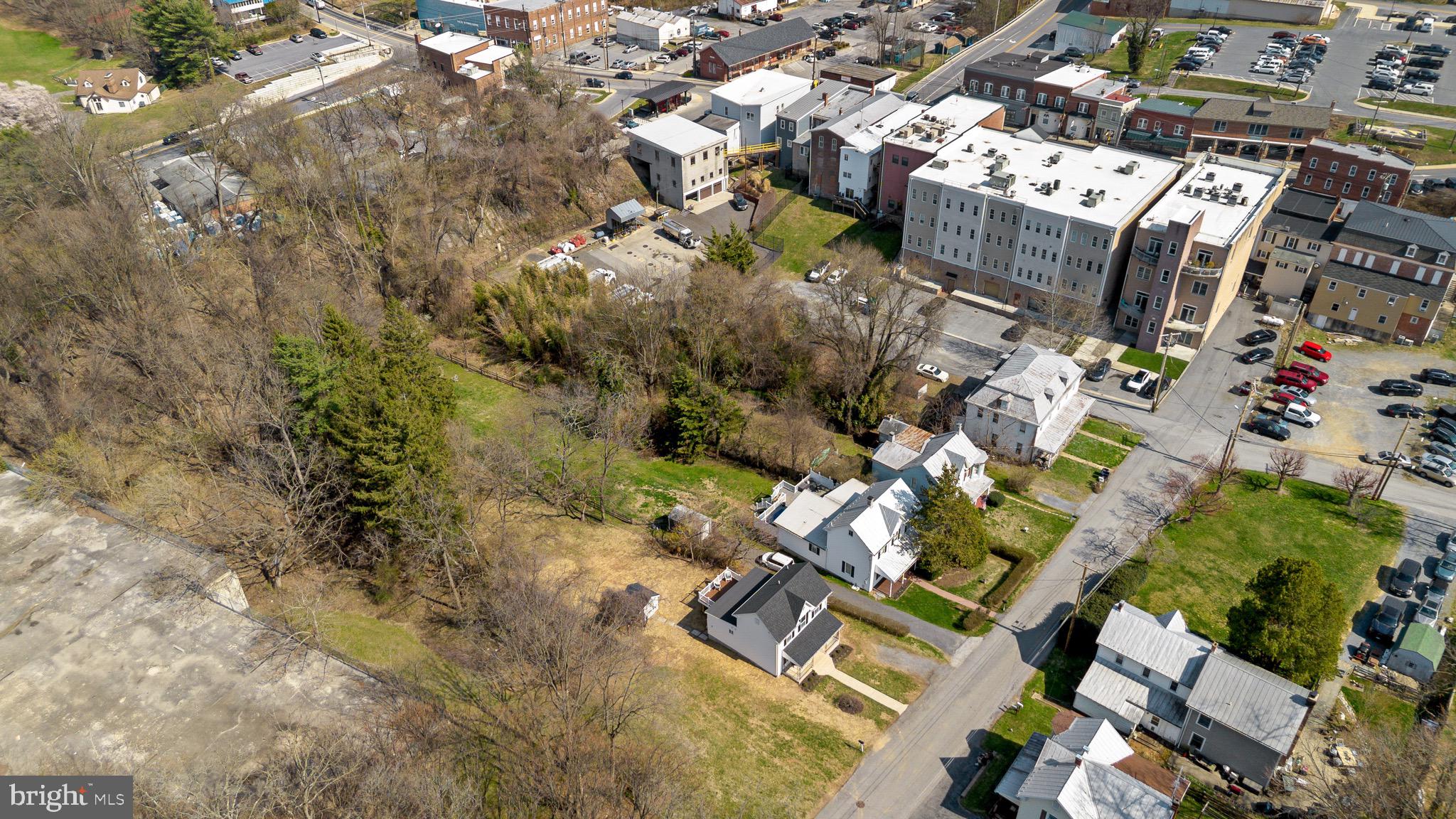 11 Baker Street Mount Airy, MD 21771 - Photo 6 of 30 an aerial view of residential house with parking space