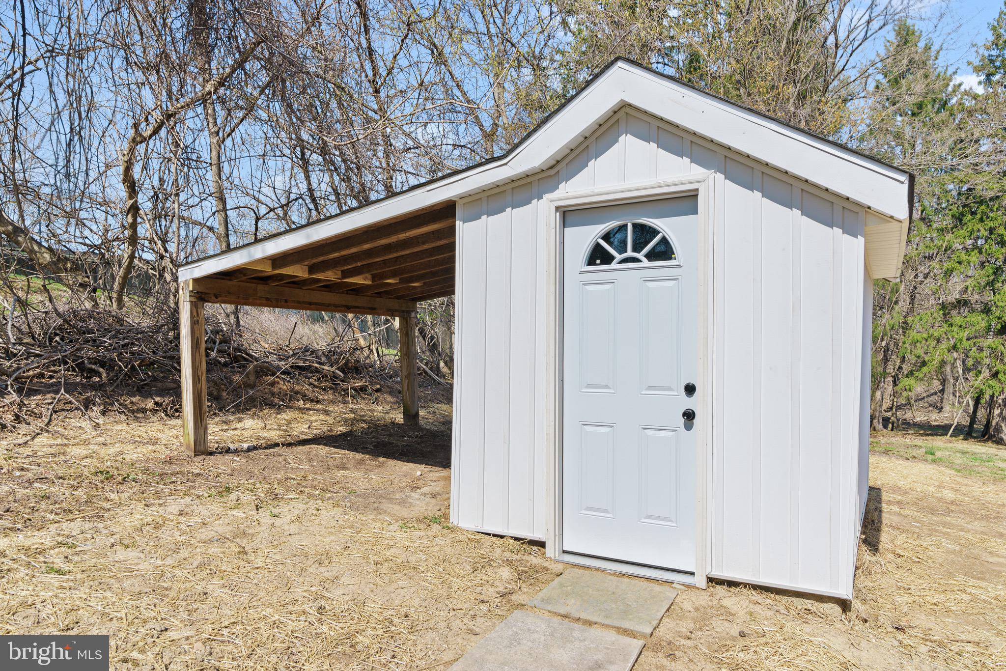 11 Baker Street Mount Airy, MD 21771 - Photo 9 of 30 a view of a small house with a yard