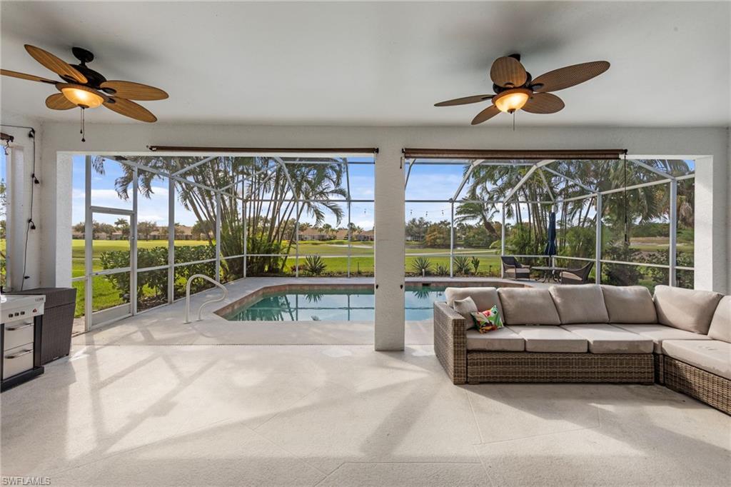 21550 Berwhich Run Estero, FL 33928 - Photo 31 of 50 a living room with furniture and a large window