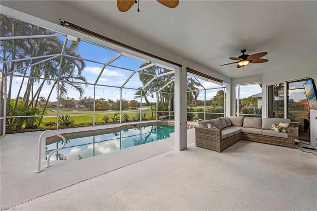 a view of swimming pool with a patio