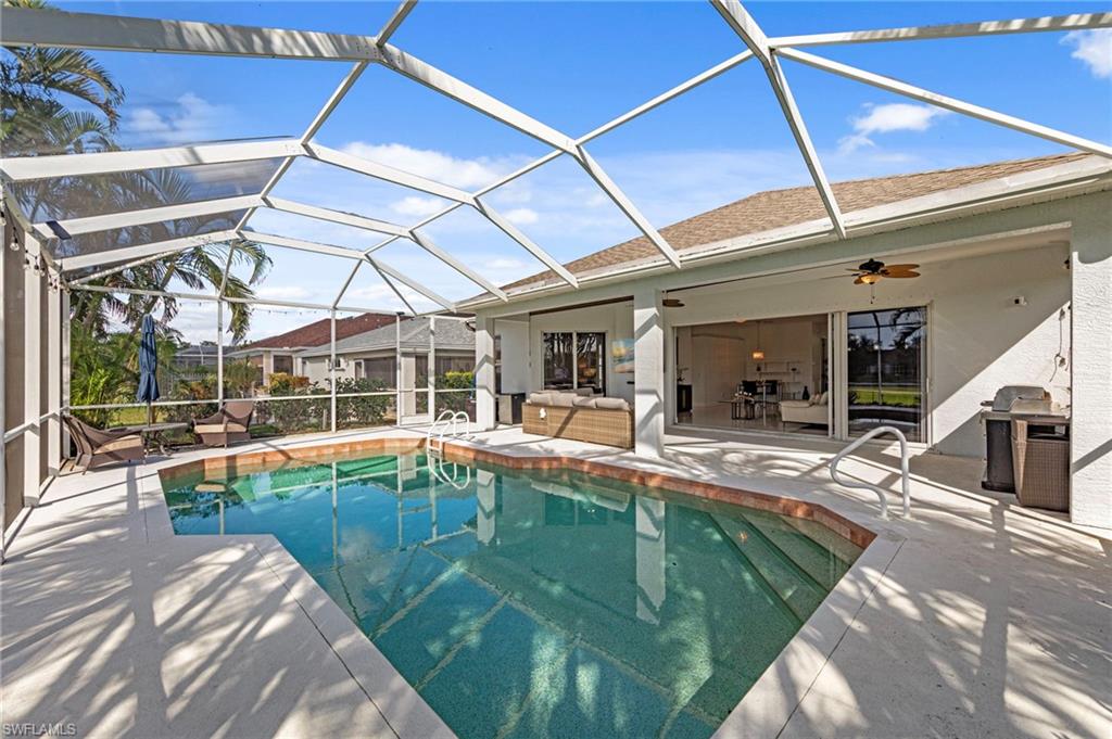 21550 Berwhich Run Estero, FL 33928 - Photo 35 of 50 a view of a backyard with swimming pool