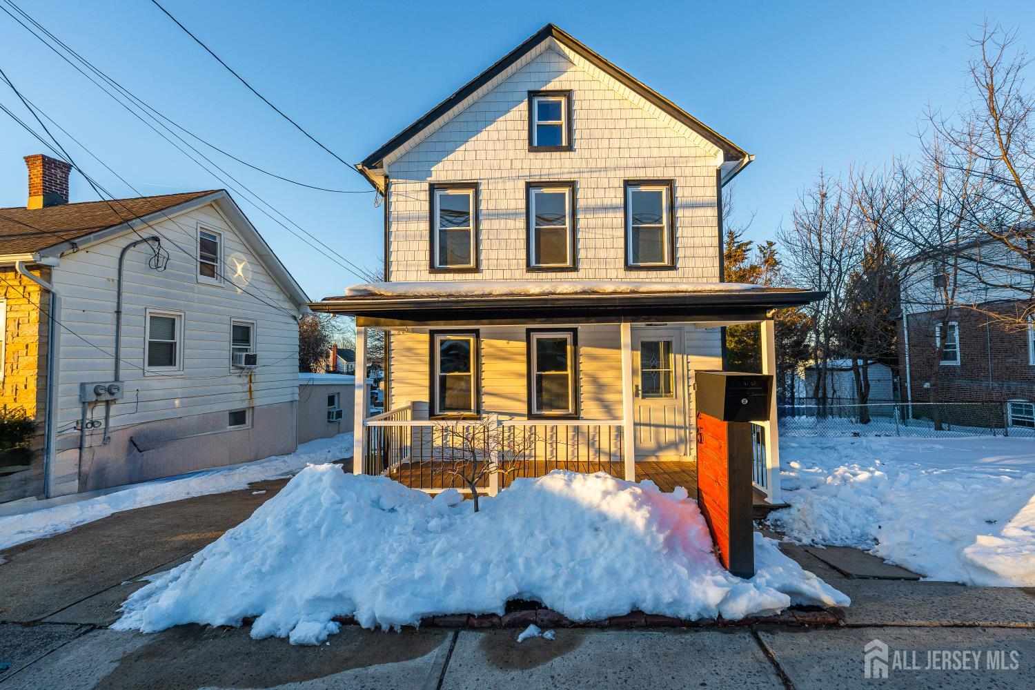 a front view of a house with porch