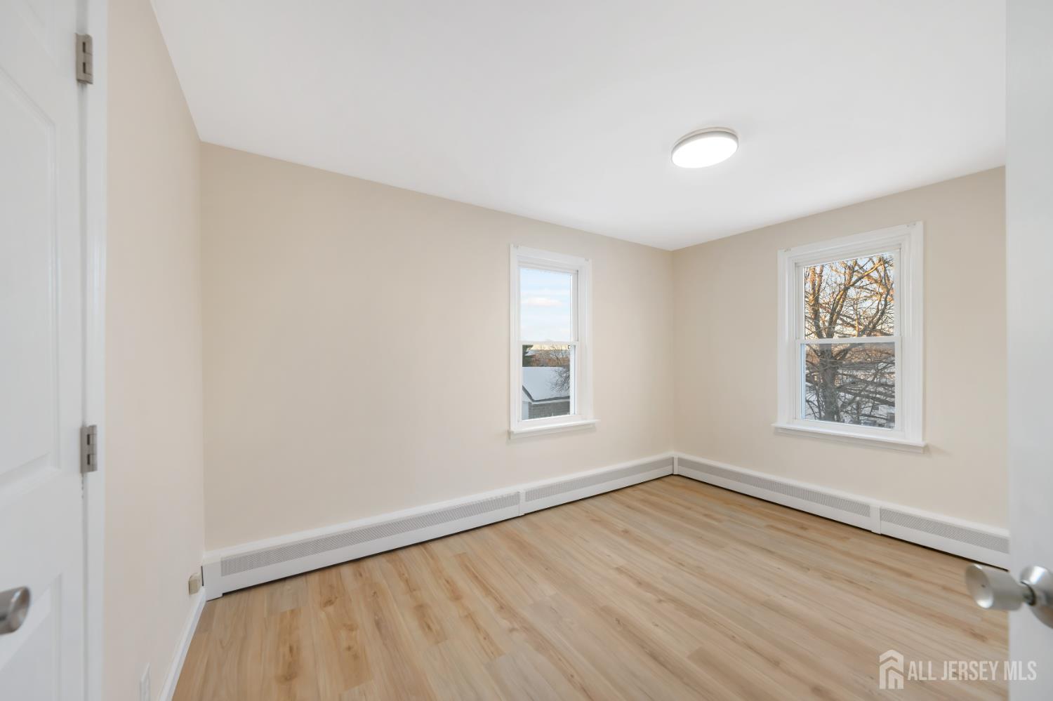 25 Dane Street Sayreville, NJ 08872 - Photo 13 of 31 an empty room with a window