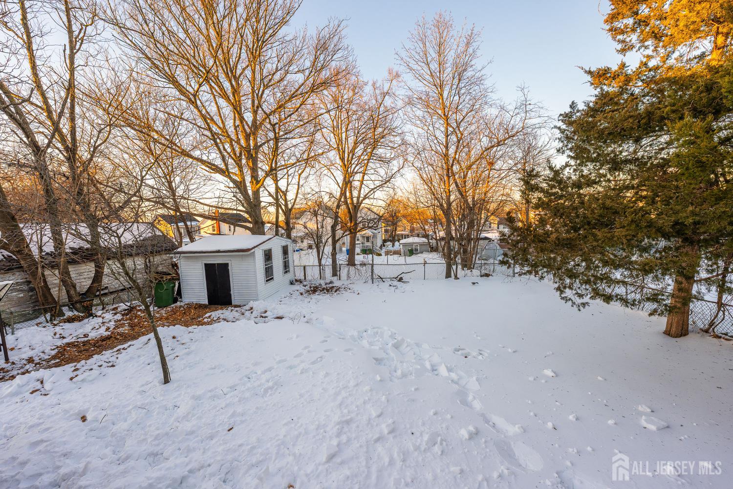 25 Dane Street Sayreville, NJ 08872 - Photo 24 of 31 a view of house with outdoor space and seating