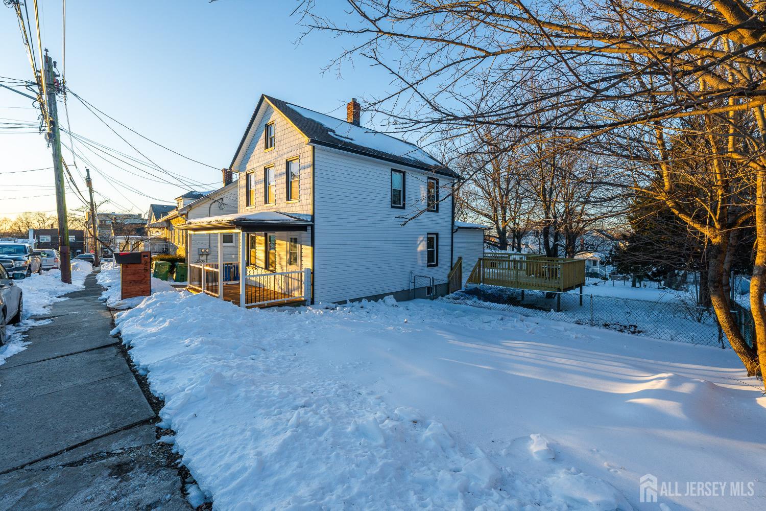 25 Dane Street Sayreville, NJ 08872 - Photo 3 of 31 a view of a house with a yard