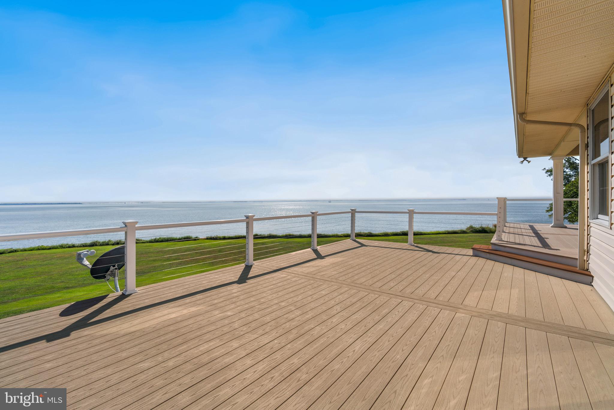 4742 Huntingfield Road Rock Hall, MD 21661 - Photo 4 of 42 Expansive deck with cable railings and awning