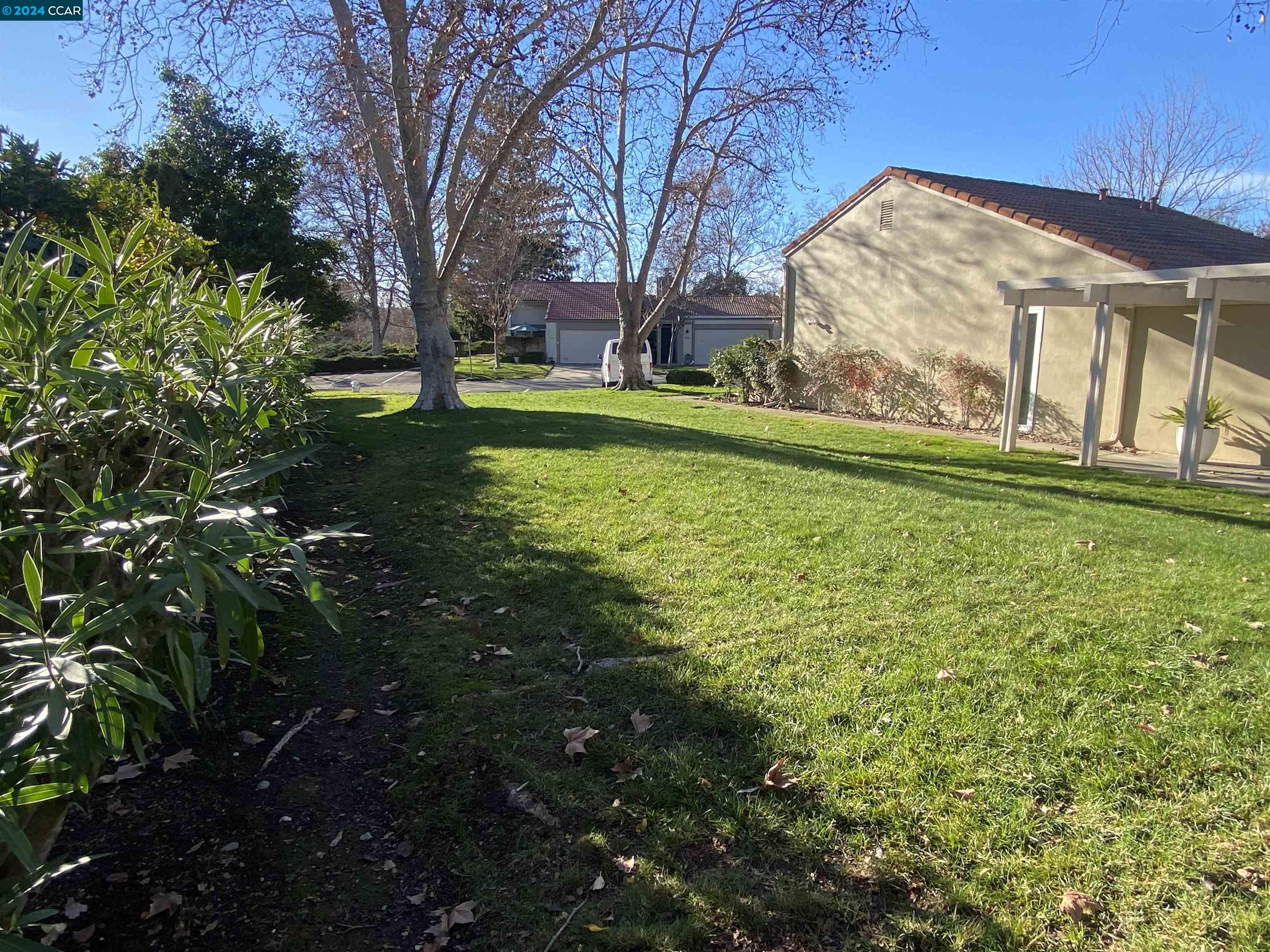 506 Tampico Walnut Creek, CA 94598 - Photo 12 of 32 a view of a house with a yard