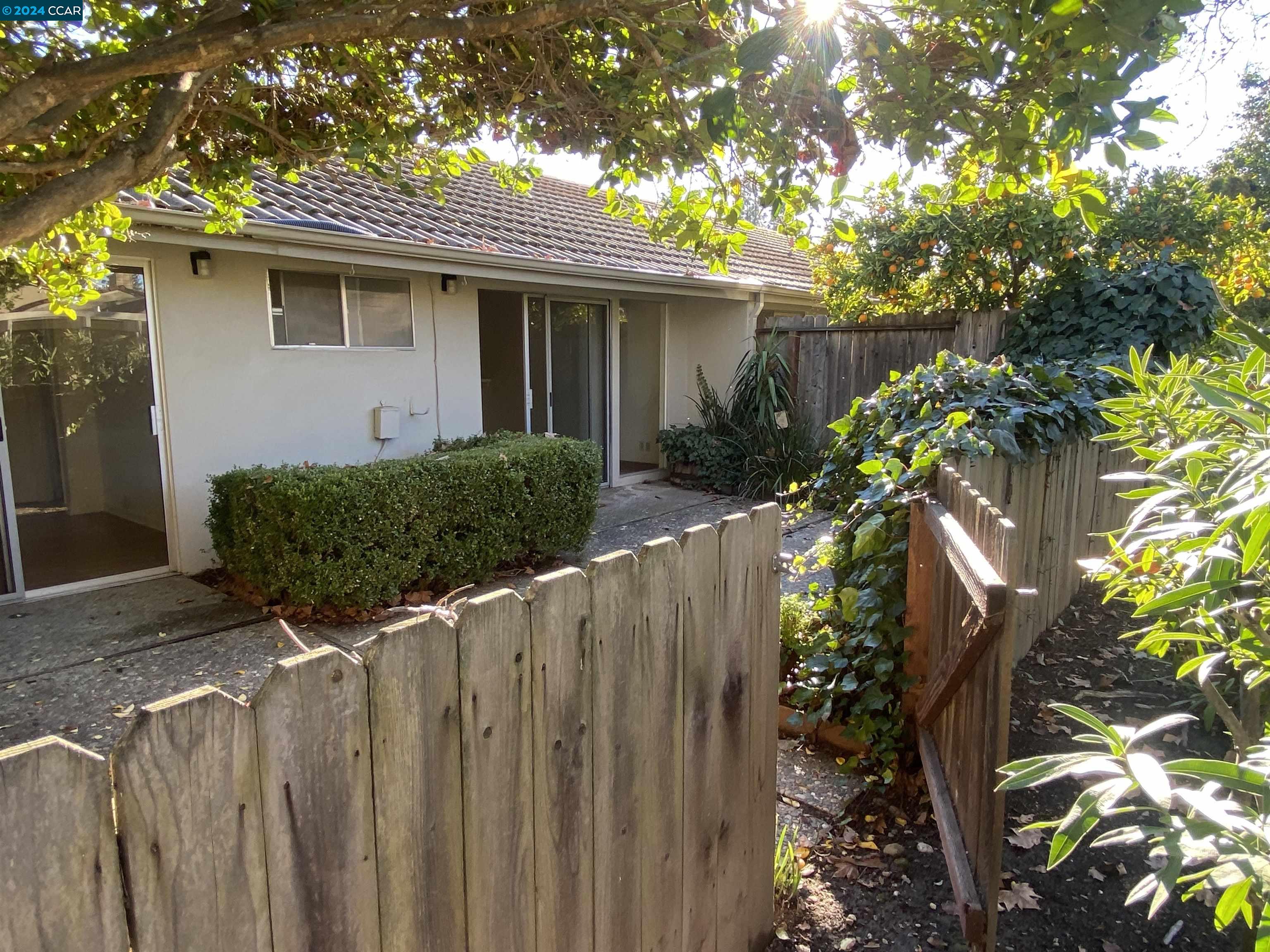 506 Tampico Walnut Creek, CA 94598 - Photo 14 of 32 a view of a house with wooden fence
