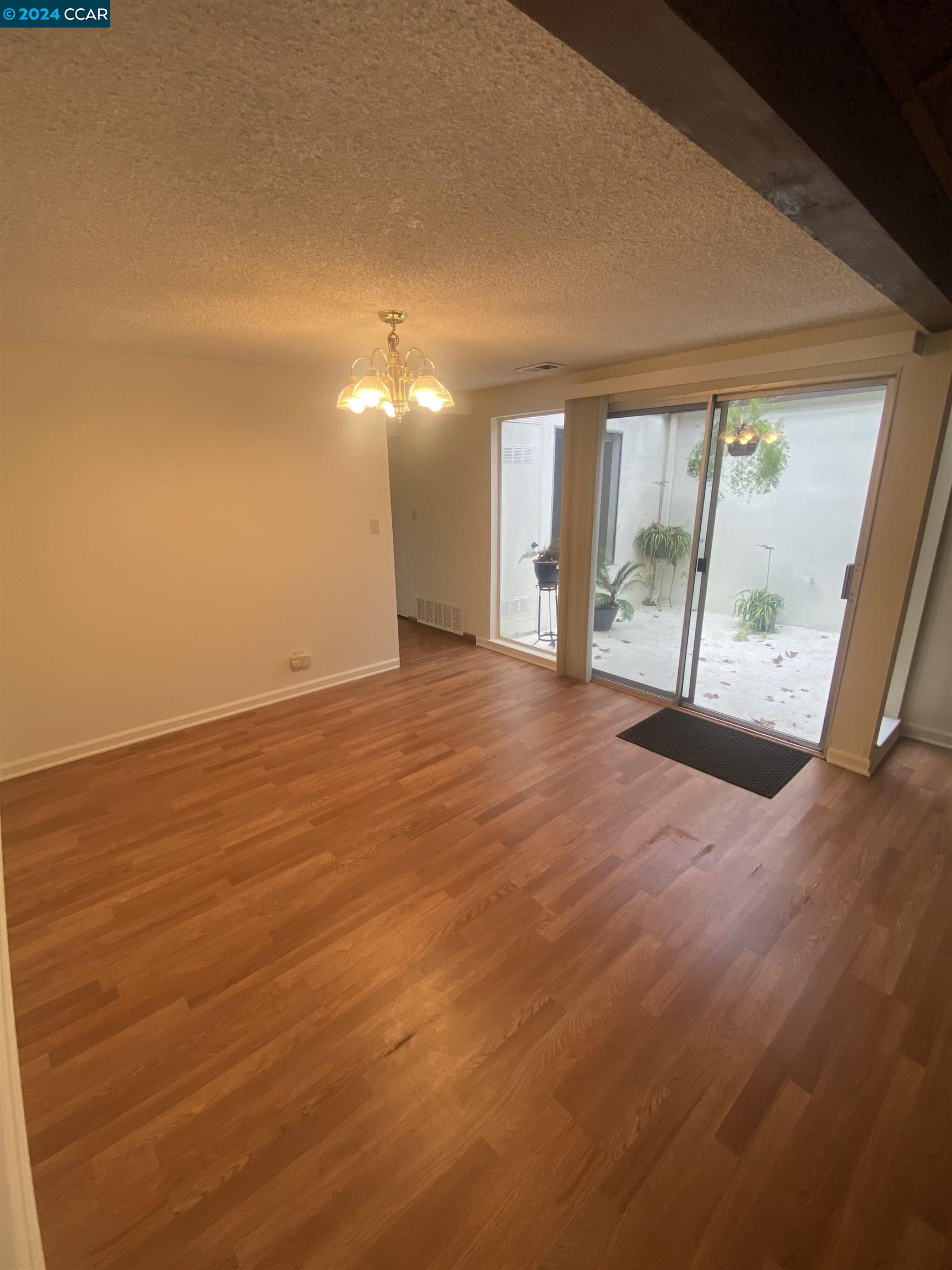 506 Tampico Walnut Creek, CA 94598 - Photo 15 of 32 a view of an empty room with a window