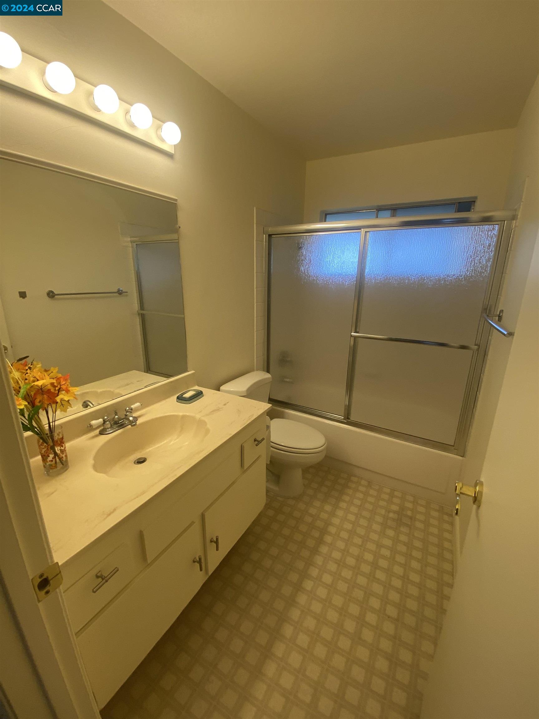 506 Tampico Walnut Creek, CA 94598 - Photo 19 of 32 a bathroom with a sink and mirror