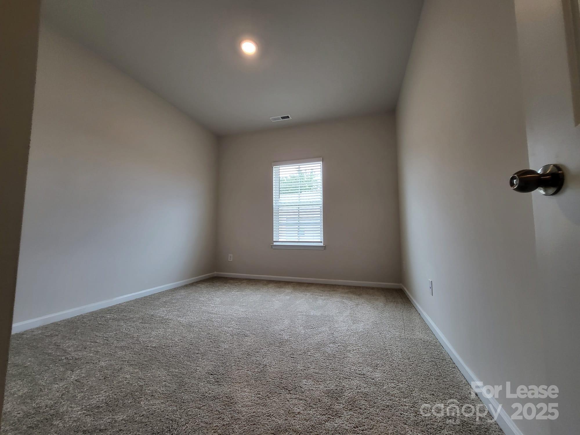 3511 Glenn Hope Way Matthews, NC 28104 - Photo 8 of 17 an empty room with a window
