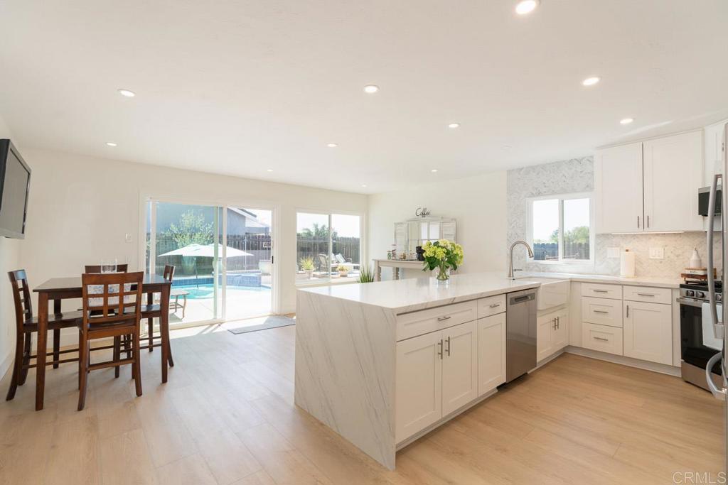 11007 Crystal Springs Road Santee, CA 92071 - Photo 10 of 33 Kitchen View to Dining and Pool