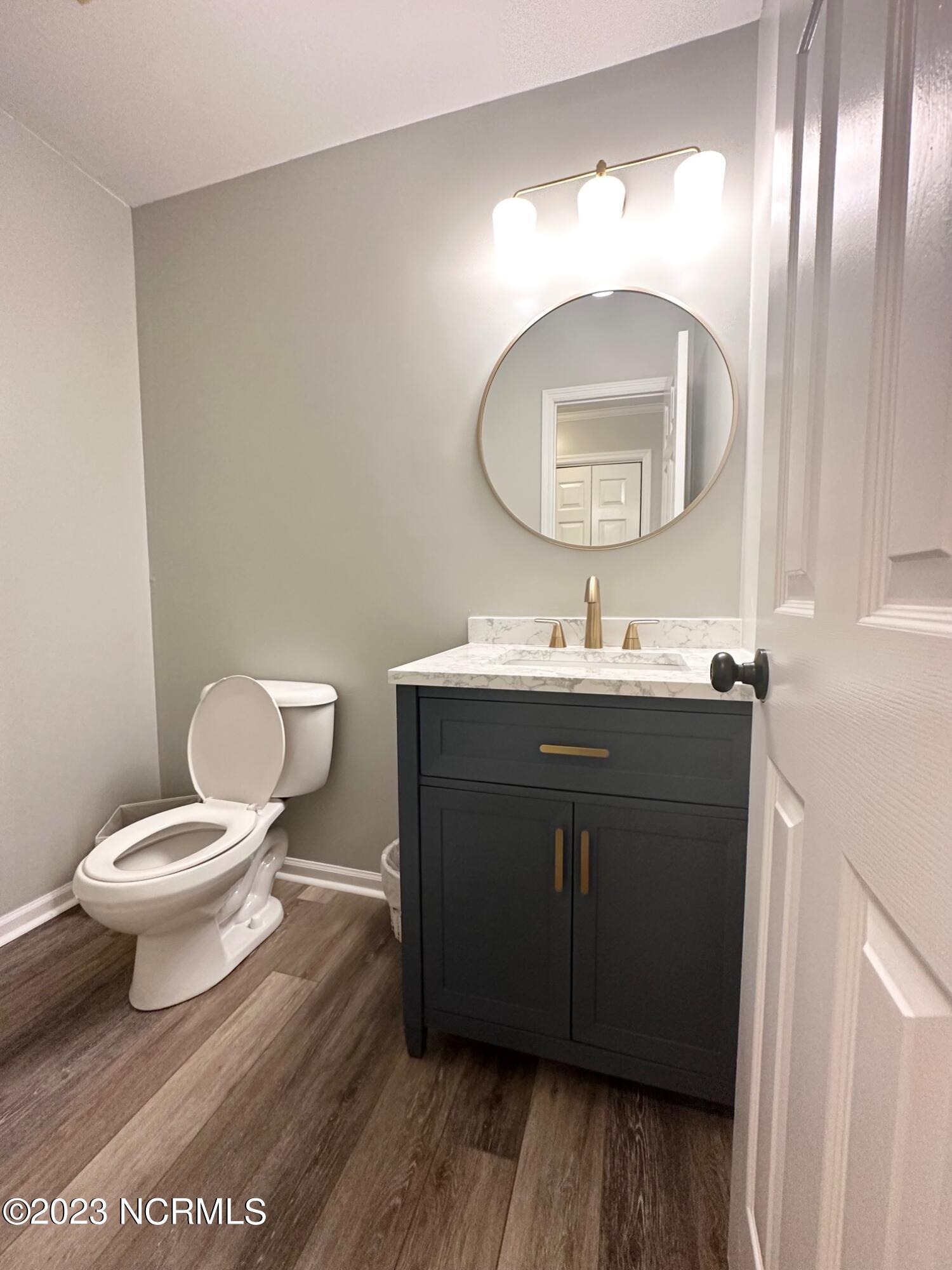 108 Quail Ridge Road Havelock, NC 28532 - Photo 21 of 32 Downstairs half bath