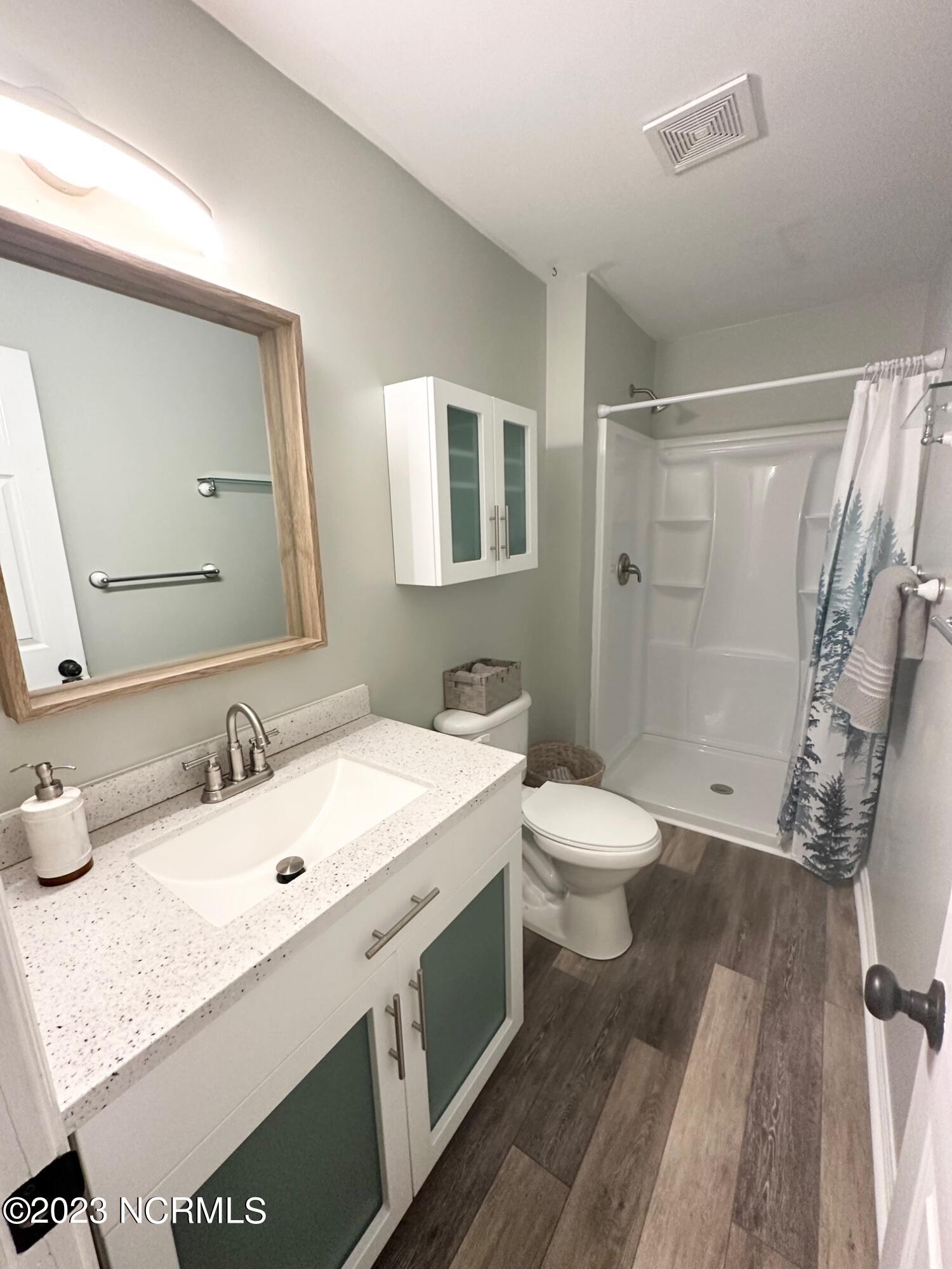 108 Quail Ridge Road Havelock, NC 28532 - Photo 24 of 32 Primary bathroom walk in shower