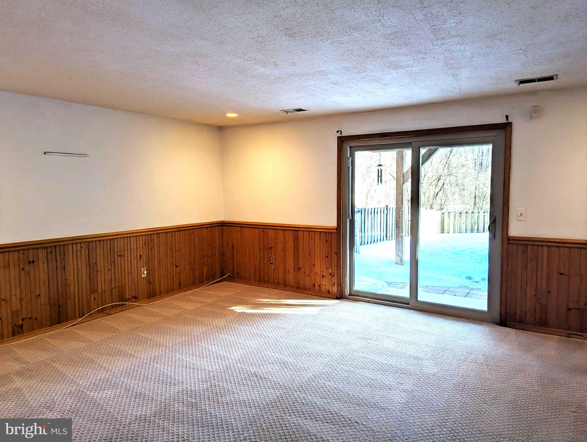 22 Bryce Court Baltimore, MD 21236 - Photo 17 of 23 Lower level family room with walk out