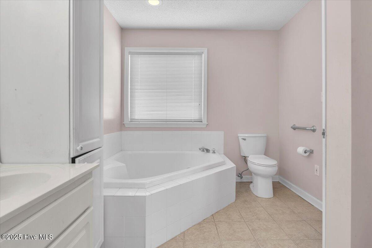 734 Sloop Pointe Lane Kure Beach, NC 28449 - Photo 18 of 54 Primary Bathroom