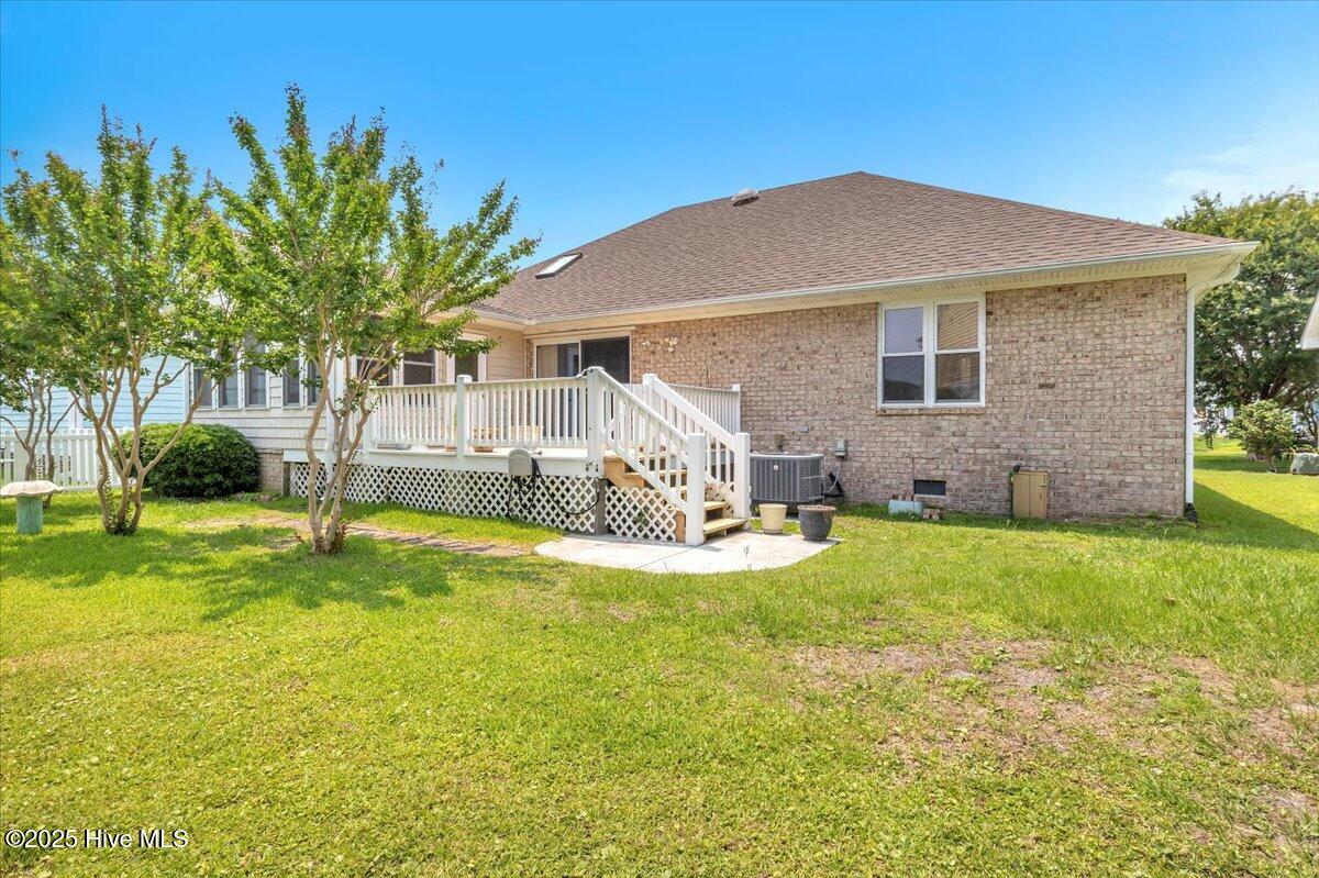 734 Sloop Pointe Lane Kure Beach, NC 28449 - Photo 33 of 54 Rear Yard