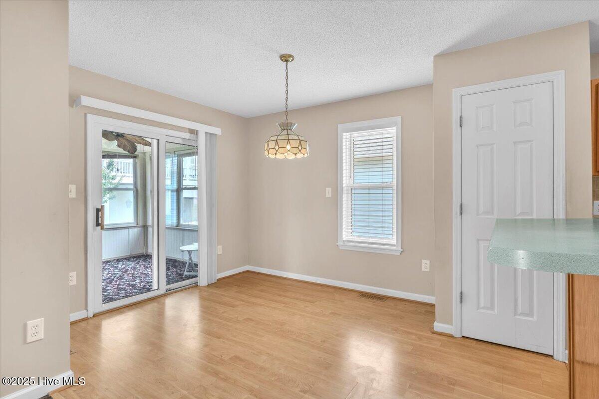 734 Sloop Pointe Lane Kure Beach, NC 28449 - Photo 9 of 54 Dining Area