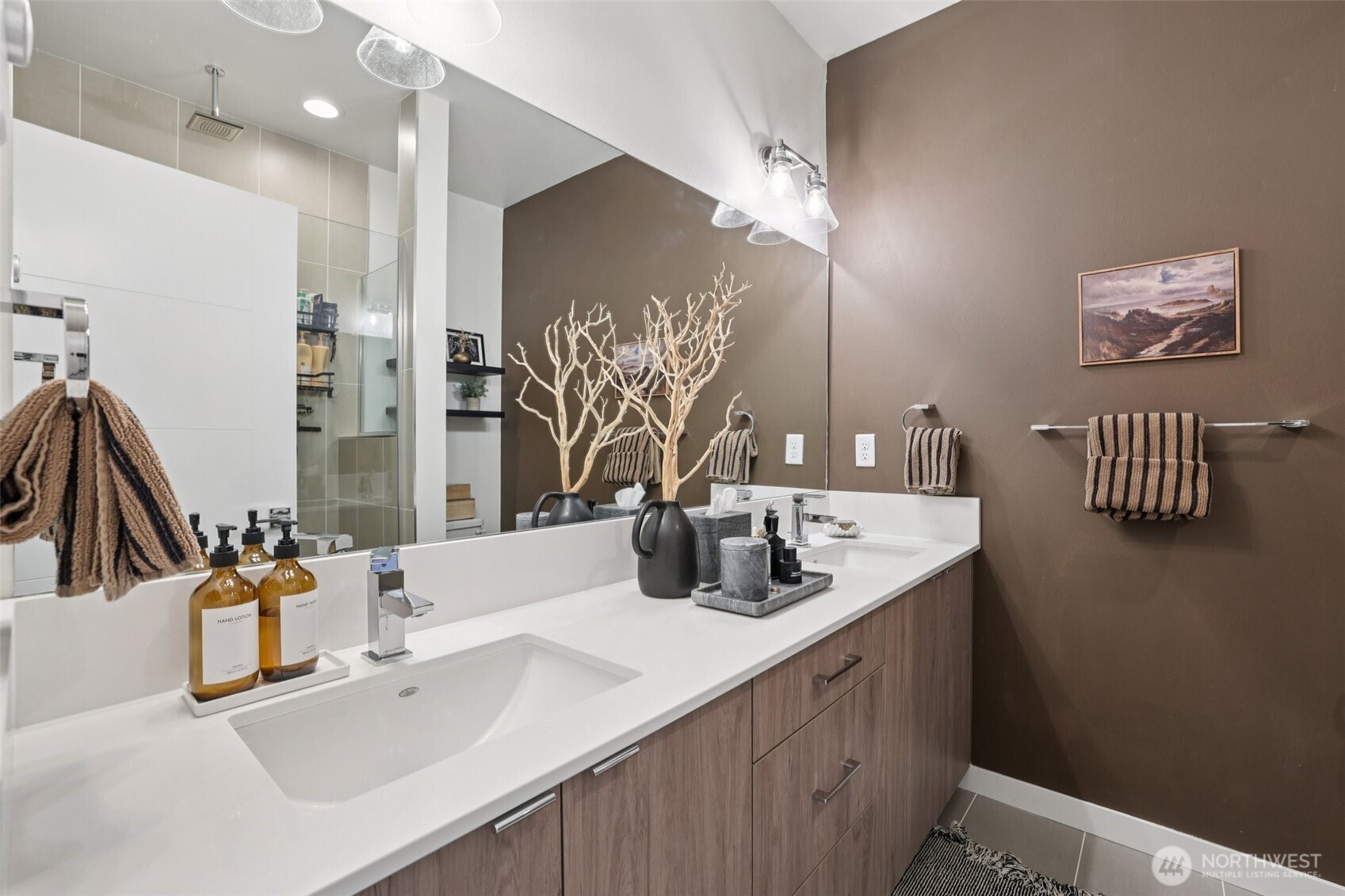 2403 Southwest Edmunds Street Seattle, WA 98106 - Photo 15 of 25 a bathroom with a sink double vanity and a mirror